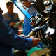 In this Friday, Feb. 1, 2019, photo, workers make sneakers at the Ryuwon Shoe Factory that specializes in sports footwear, in Pyongyang, North Korea. North Korean pop culture, long dismissed by critics as a kitschy throwback to the dark days of Stalinism, is getting a major upgrade under leader Kim Jong Un. The changes are being seen in everything from television dramas and animation programs to the variety and packaging of consumer goods, which have improved significantly under Kim. (AP Photo/Dita Alangkara)